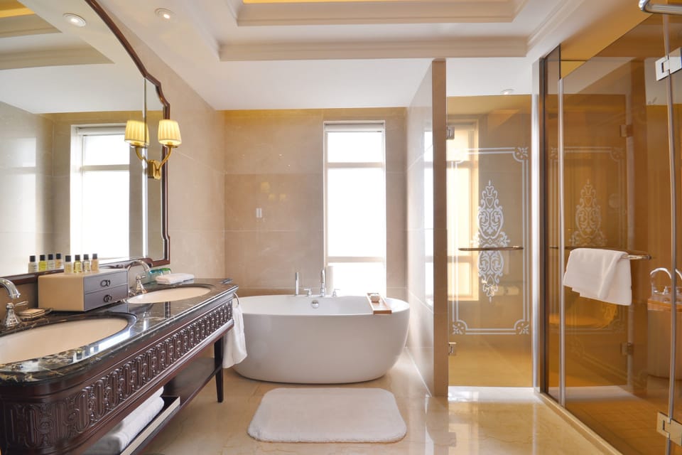 Shower, free toiletries, hair dryer, slippers