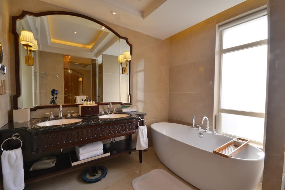 Shower, free toiletries, hair dryer, slippers