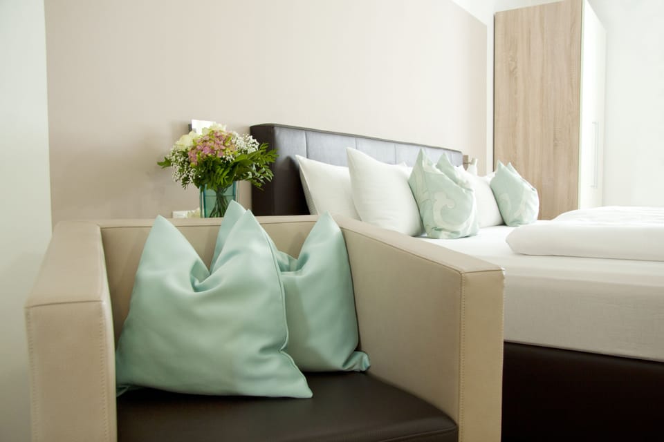 Economy Double Room (Semi-Basement) | Desk, blackout drapes, soundproofing, iron/ironing board