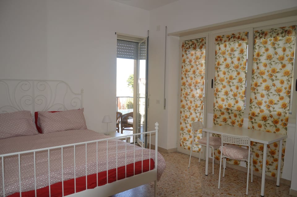Deluxe Room, 1 Queen Bed, Balcony, City View | Desk, blackout drapes, iron/ironing board, free WiFi