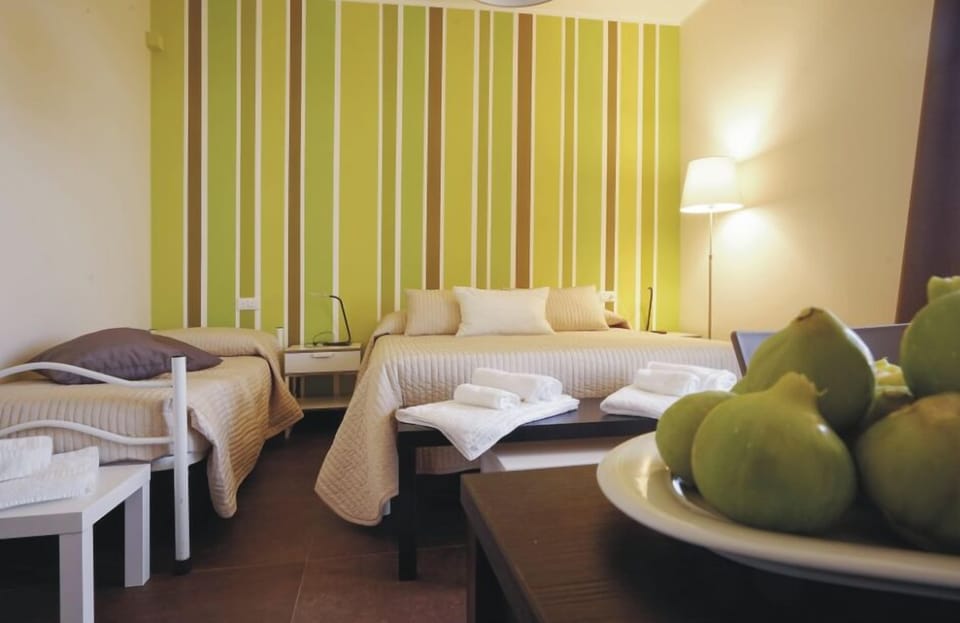 Grand Triple Room, Terrace, Hill View | 1 bedroom, hypo-allergenic bedding available, down comforters, minibar