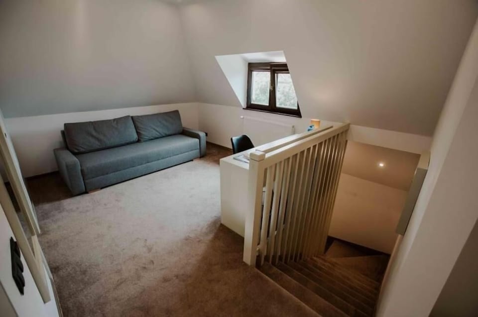 Standard Double Room | Living room | Flat-screen TV