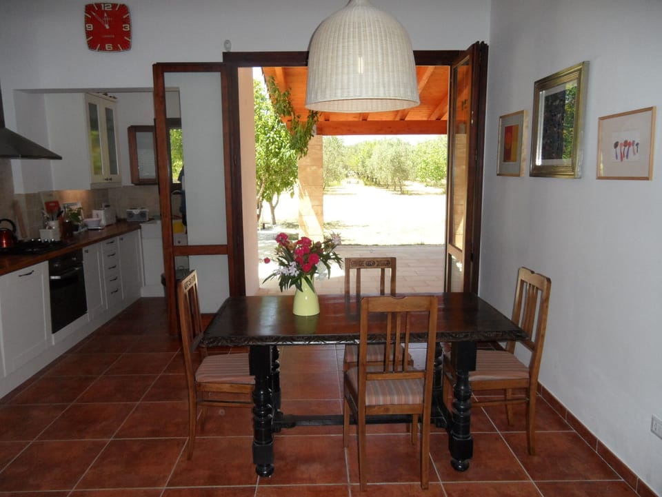 Kitchen diner area with view of olive groves