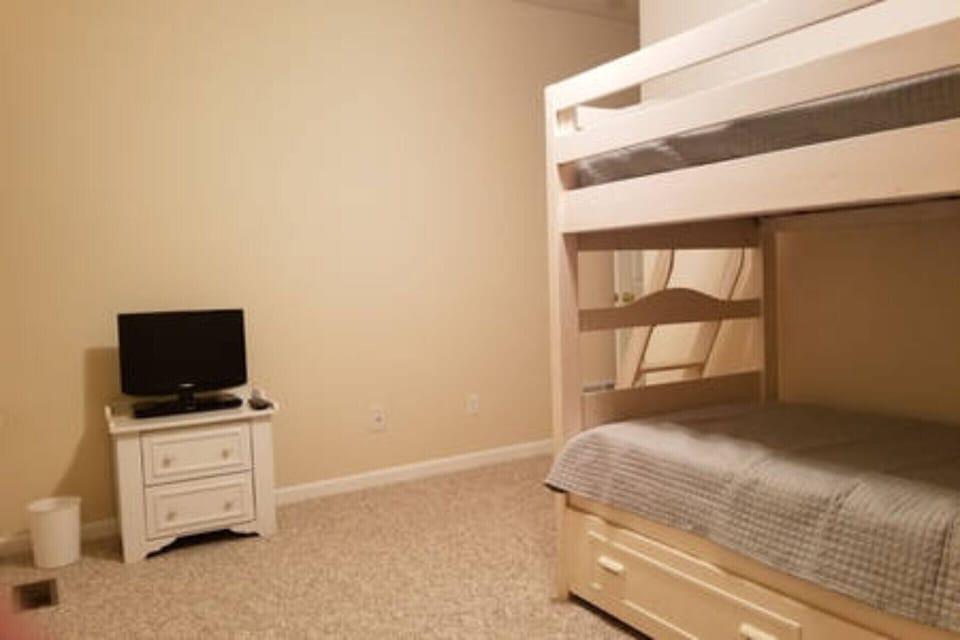 Bunk bed room with 3 twin beds with tv and dvd player (no cable hook up)