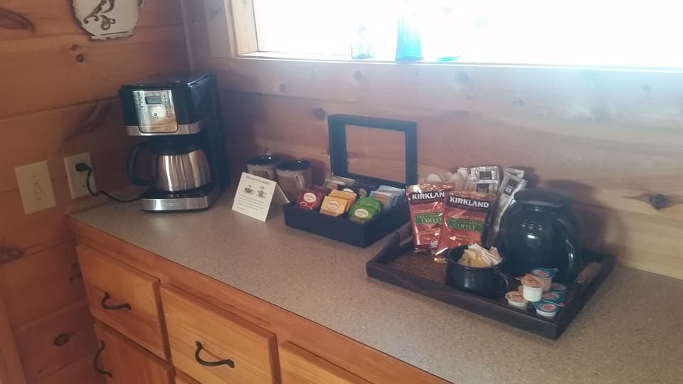 A coffee and tea bar awaits the lucky guests in the loft king bedroom!