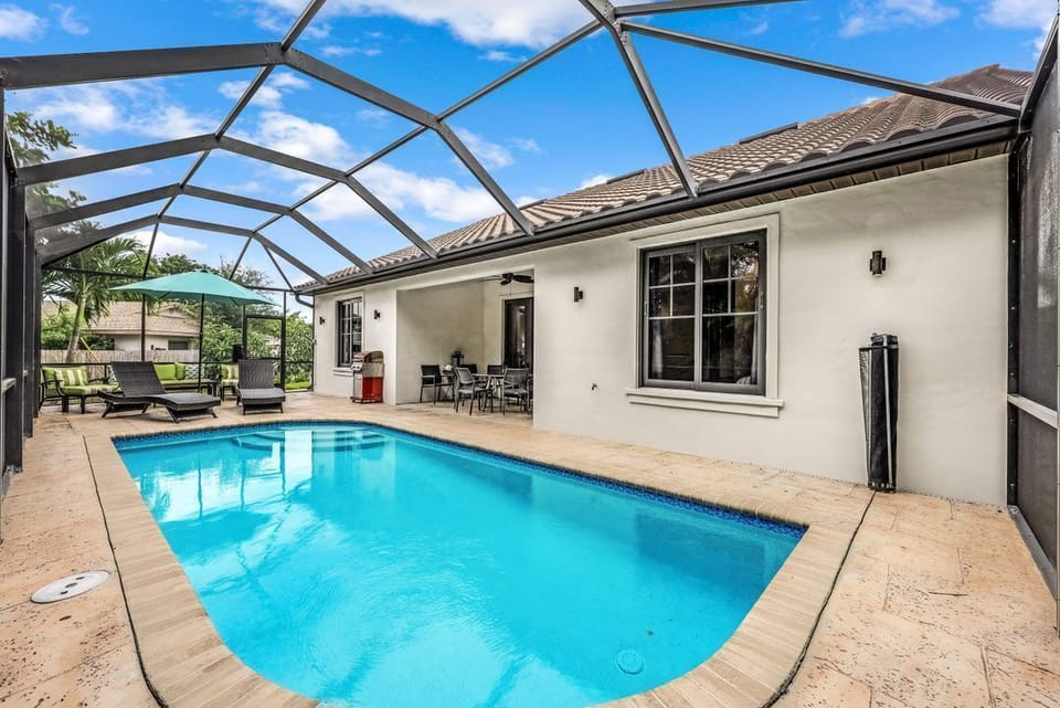 Private, screened-in and heated pool area