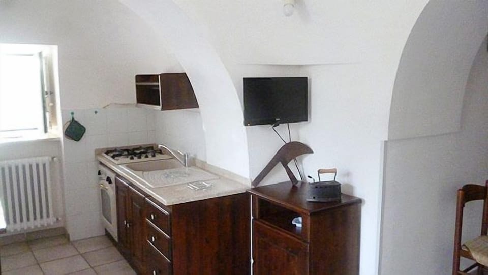 Classic Apartment, 2 Bedrooms | Living area | 22-inch flat-screen TV with digital channels, TV
