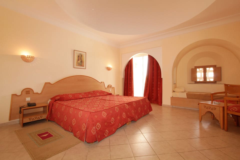 Family Quadruple Room, 1 Bedroom, Non Smoking, Garden Area | In-room safe, desk, laptop workspace, blackout drapes