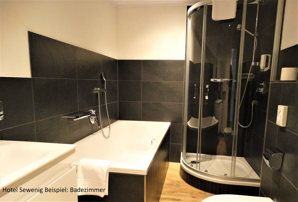 Shower, free toiletries, hair dryer, slippers