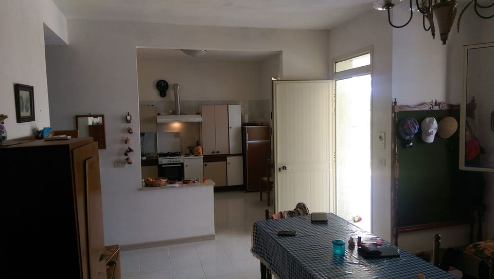 part of the living room with the kitchen at the bottom