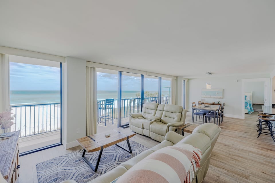 Open living, dining, and kitchen all with an amazing view
