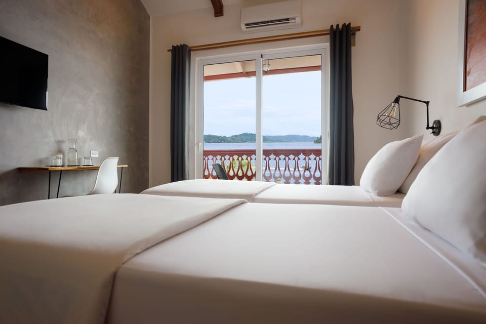 Twin Room, Sea View | Hypo-allergenic bedding available, in-room safe, desk, laptop workspace