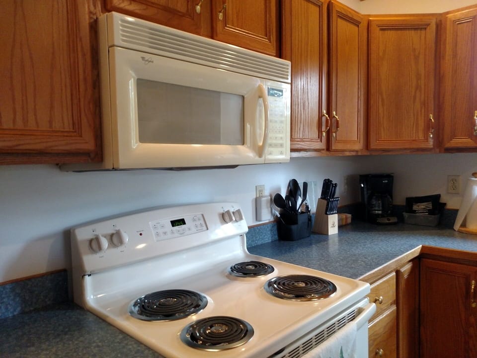 FULL SIZED KITCHEN WITH AMENITIES - COFFEE, TEA, ETC