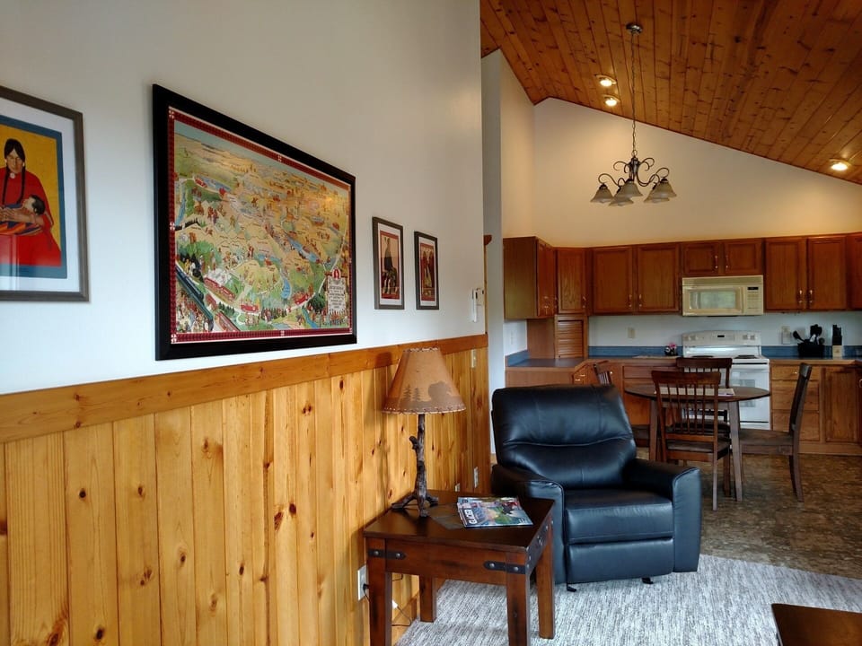OPEN CONCEPT FLOOR PLAN & CATHEDRAL CEILINGS MAKE THE CABIN ROOMY & COMFY