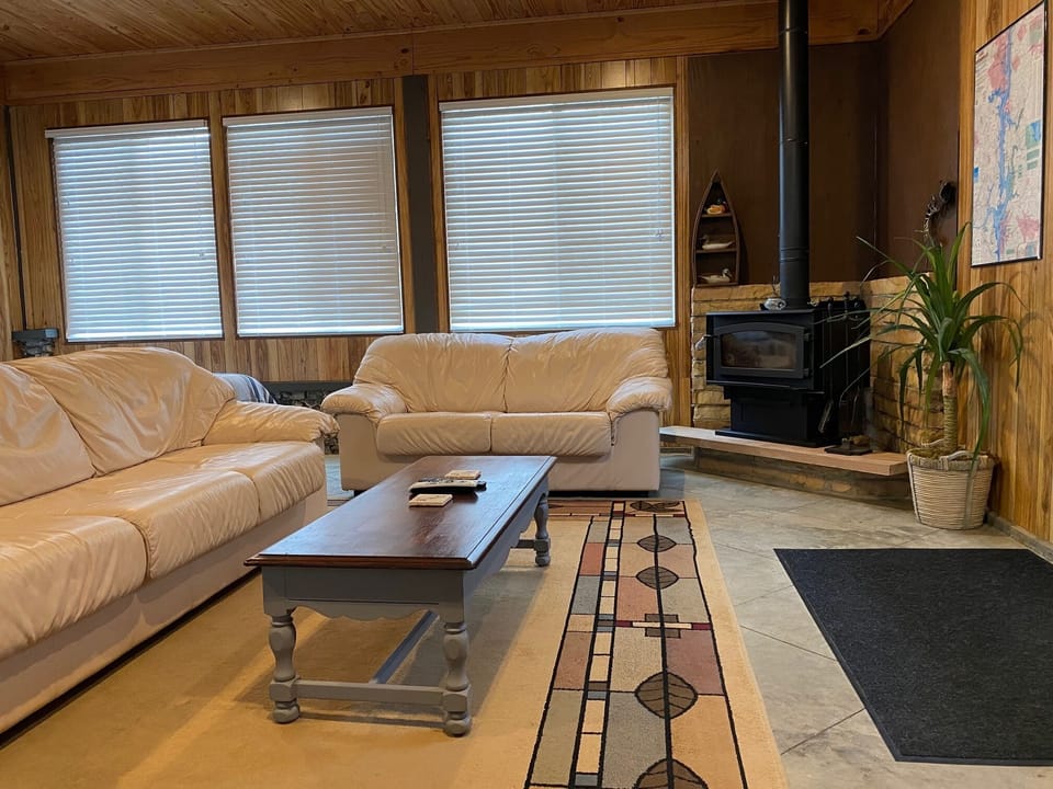 Second bedroom with seating and 48" HDTV