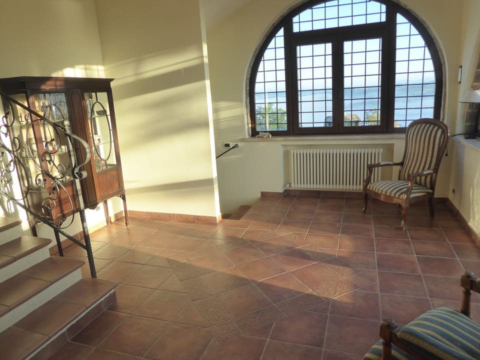 Spacious upper entrance from pool side of villa.