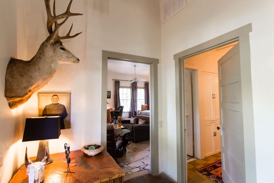 foyer with entrance to master and bath