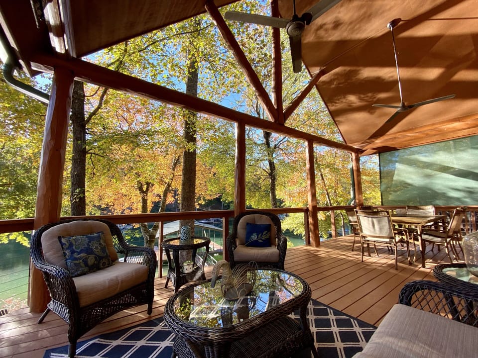 Comfortable seating on the lakefront deck, covered from the sun or rain.