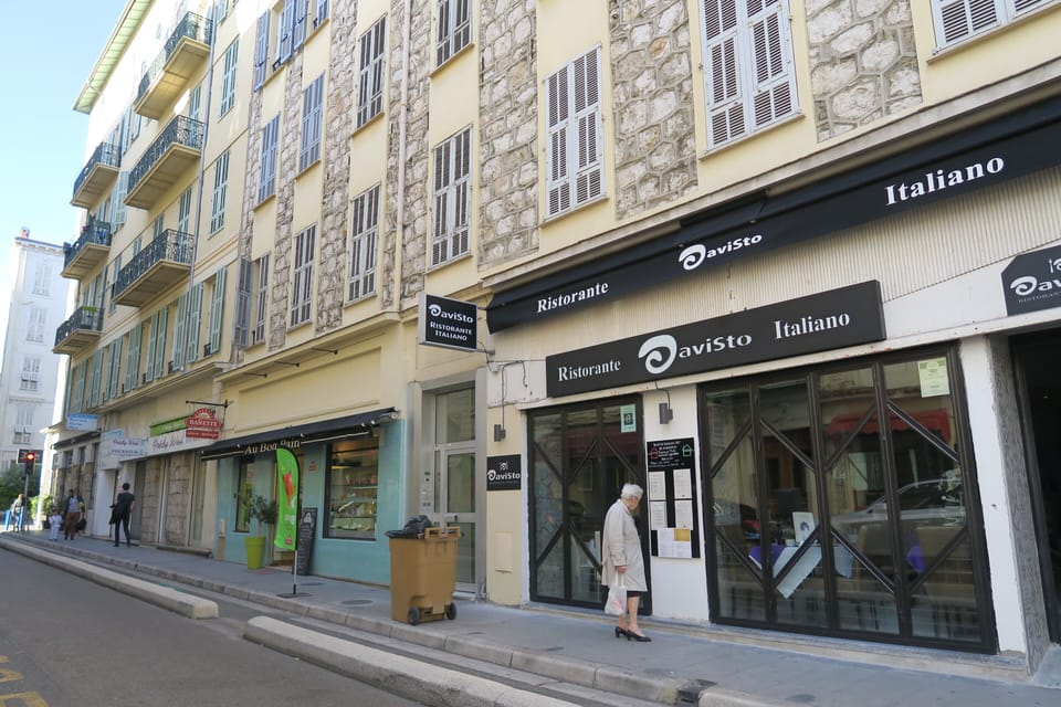 Building entrance, with restaurant and bakery downstairs