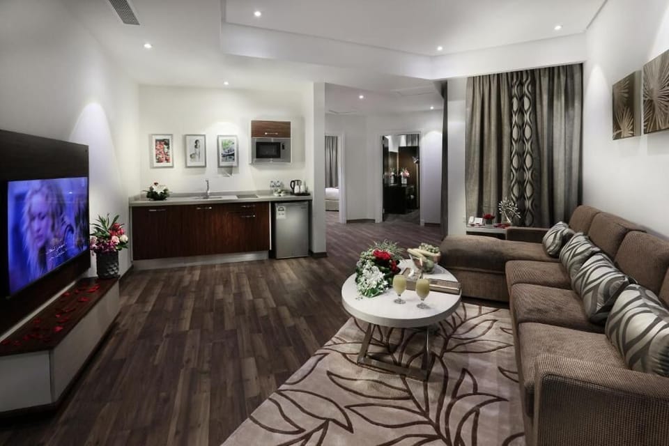 Deluxe Apartment, 2 Bedrooms | Living area | LCD TV