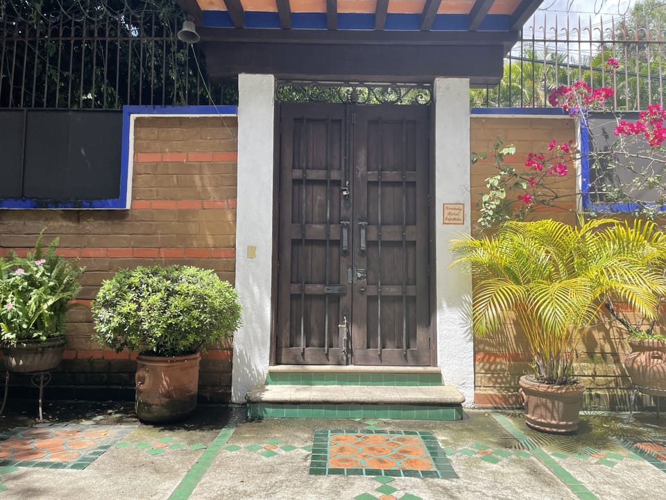 View from the front courtyard to the entryway to the villa.