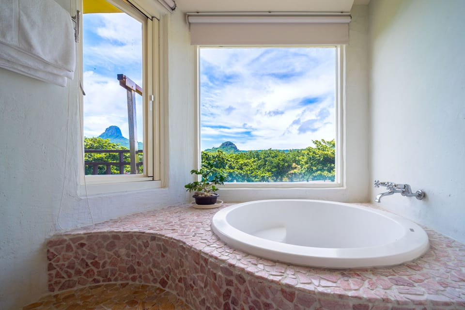 Mountain View Double Room with Balcony | Bathroom | Hair dryer, slippers, towels, shampoo