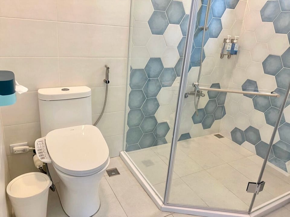 Comfort Quadruple Room, 2 Double Beds, Mountain View | Bathroom | Shower, hair dryer, slippers, towels