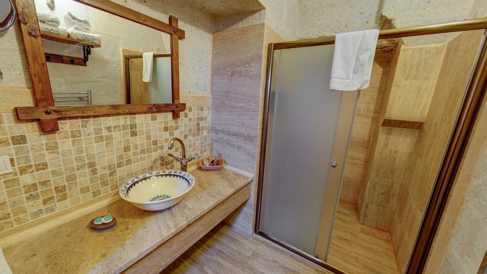Shower, free toiletries, hair dryer, bathrobes