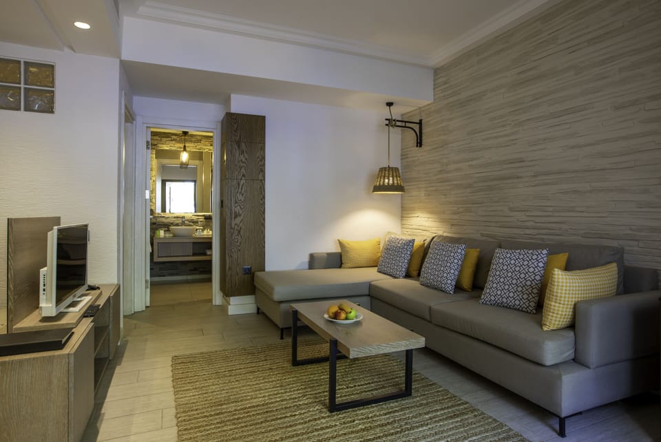 Bungalow, 2 Bedrooms, Garden View | Living area | 28-inch LCD TV with digital channels, TV