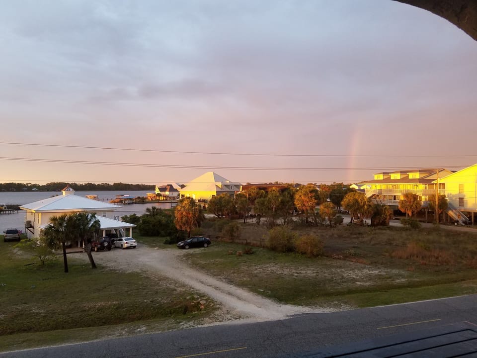 Rainbow off the balcony after a day at the beach