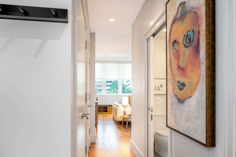 Main landing area, features coat hook and space for shoes