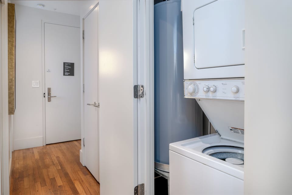 Stacked laundry in hall 