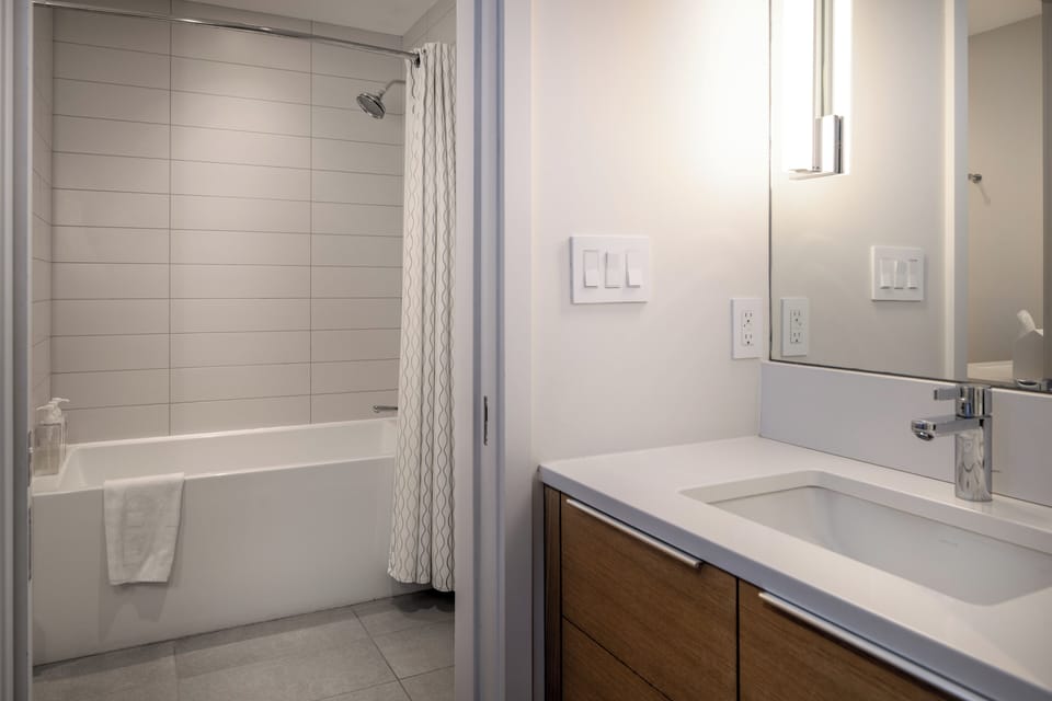 Full bath and attached secondary 1/2 bath, can be closed via pocket doors