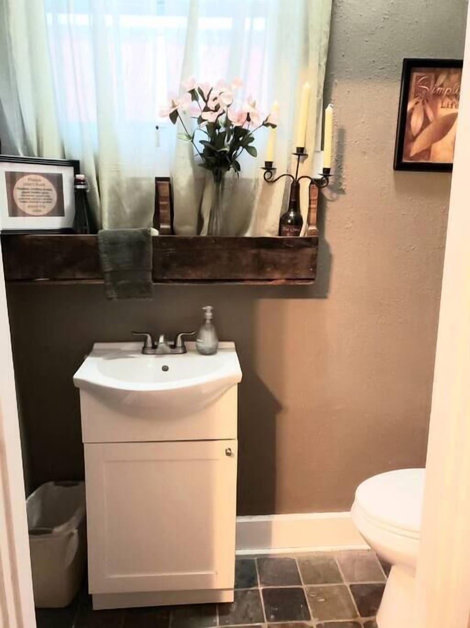 Half bathroom off master bedroom.