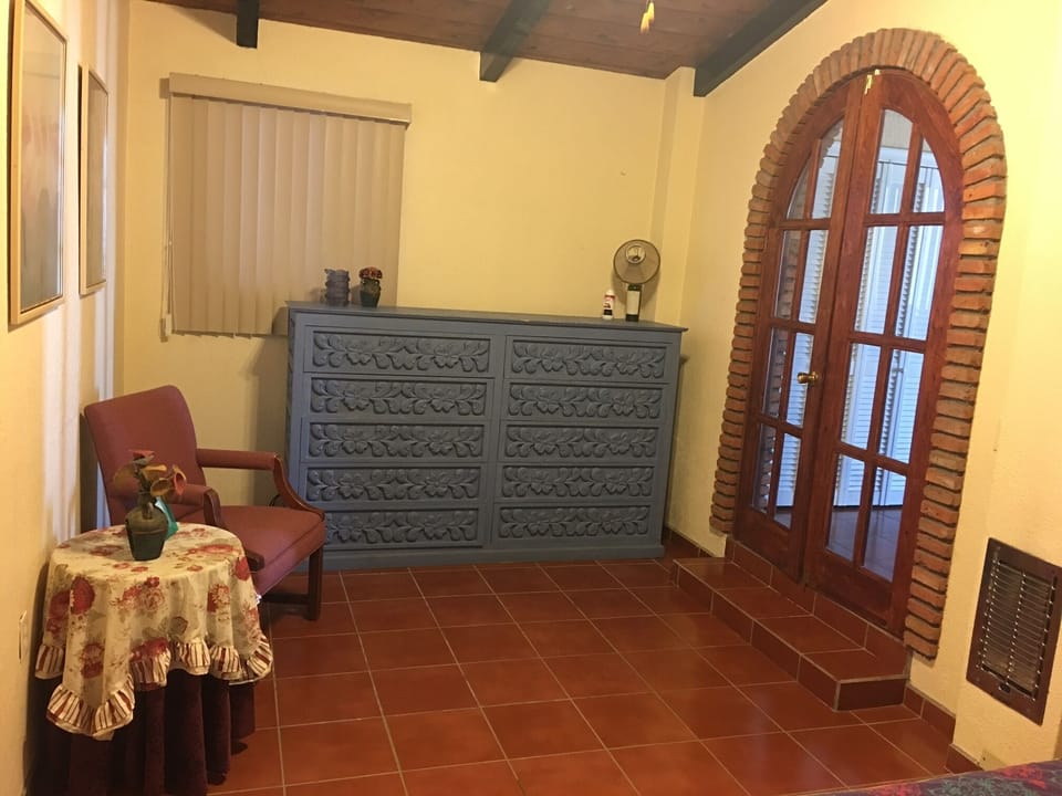 Guest House  Master Bed room with large Mexican themed window and ocean view