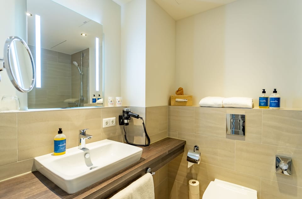 Shower, free toiletries, hair dryer, towels