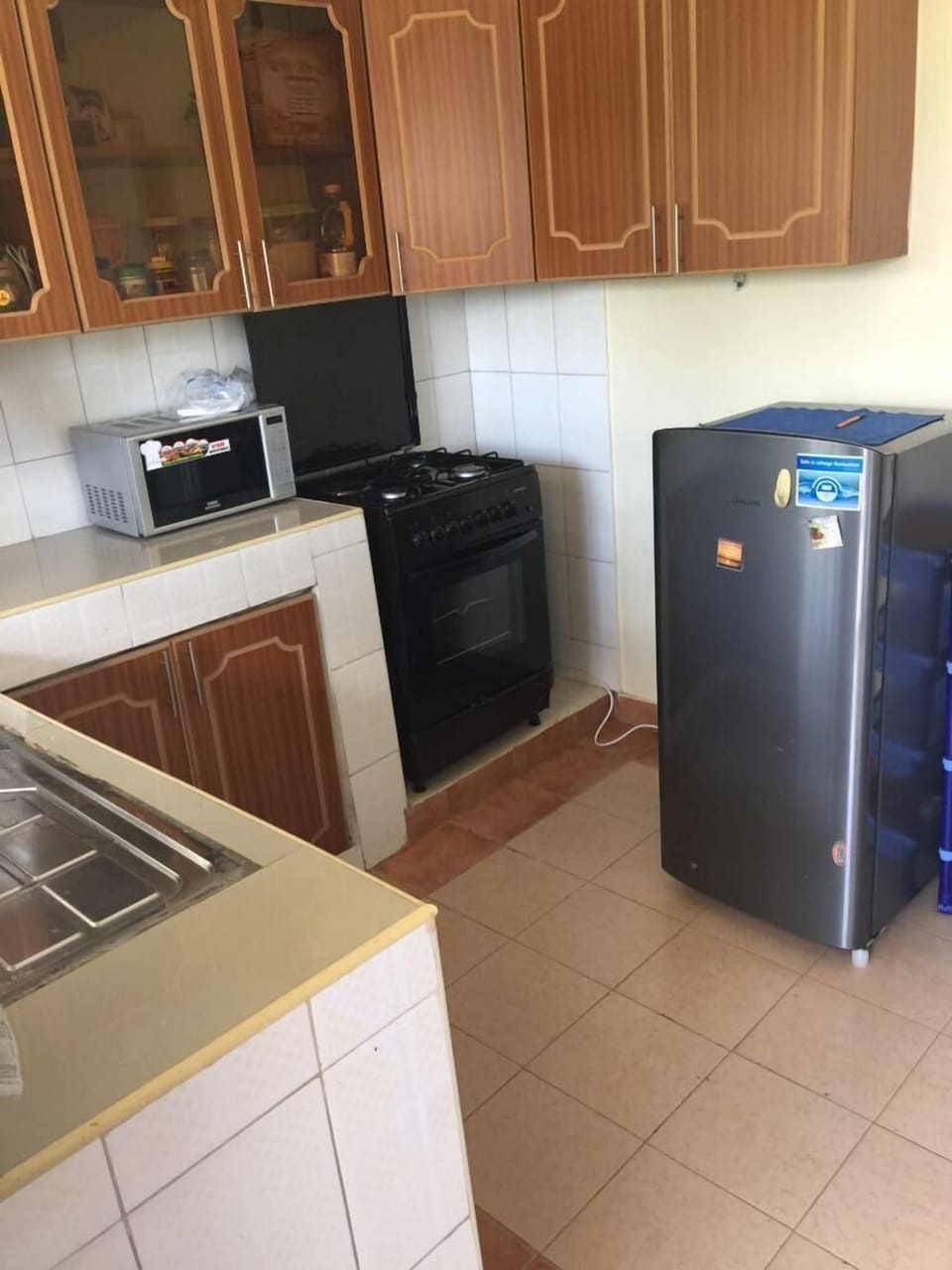 Apartment, 2 Bedrooms | Private kitchenette | Full-size fridge, microwave, stovetop, coffee/tea maker