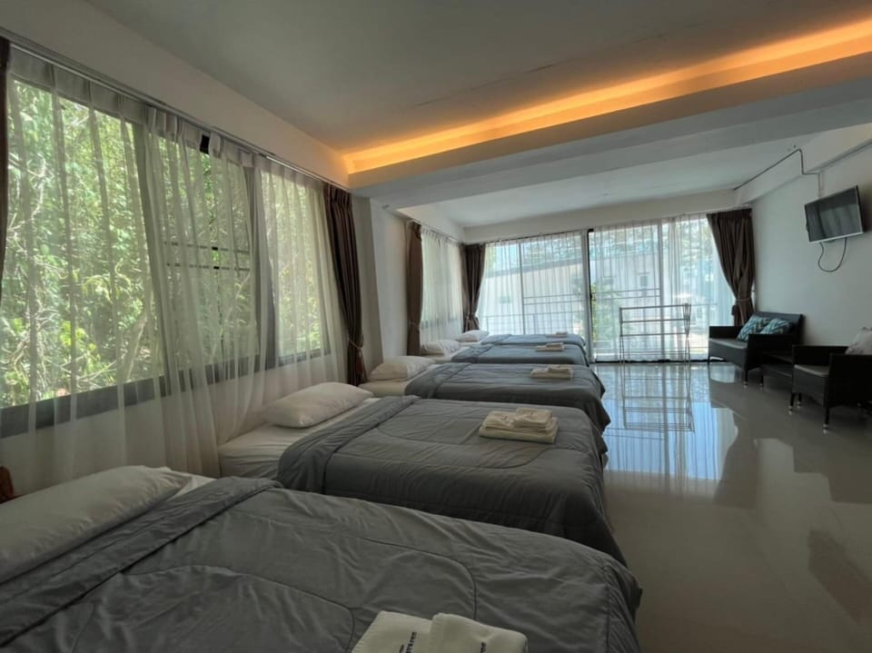 Family Room, Multiple Beds, Non Smoking | Blackout drapes, WiFi (free), bed sheets