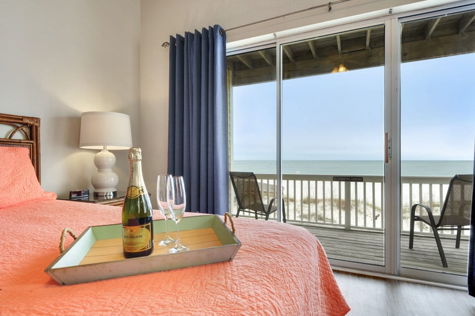 2nd floor master with king bed and balcony 