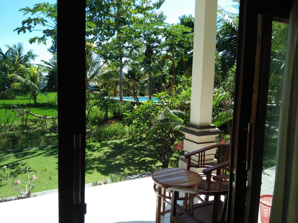 Basic Double Room, 1 Bedroom, Pool View | Desk, iron/ironing board, free WiFi