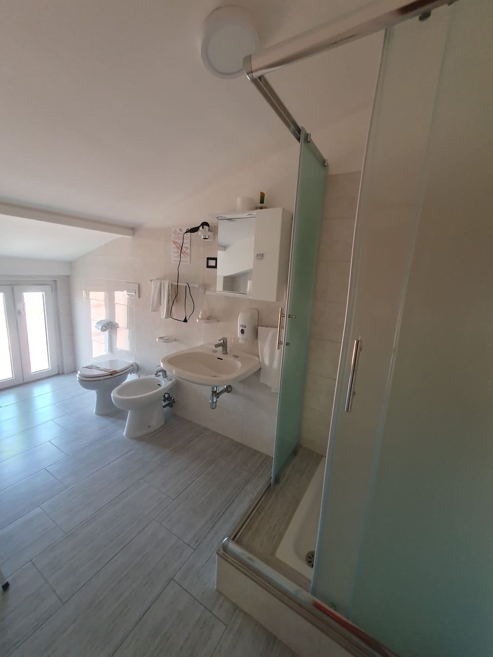 Free toiletries, hair dryer, slippers, bidet