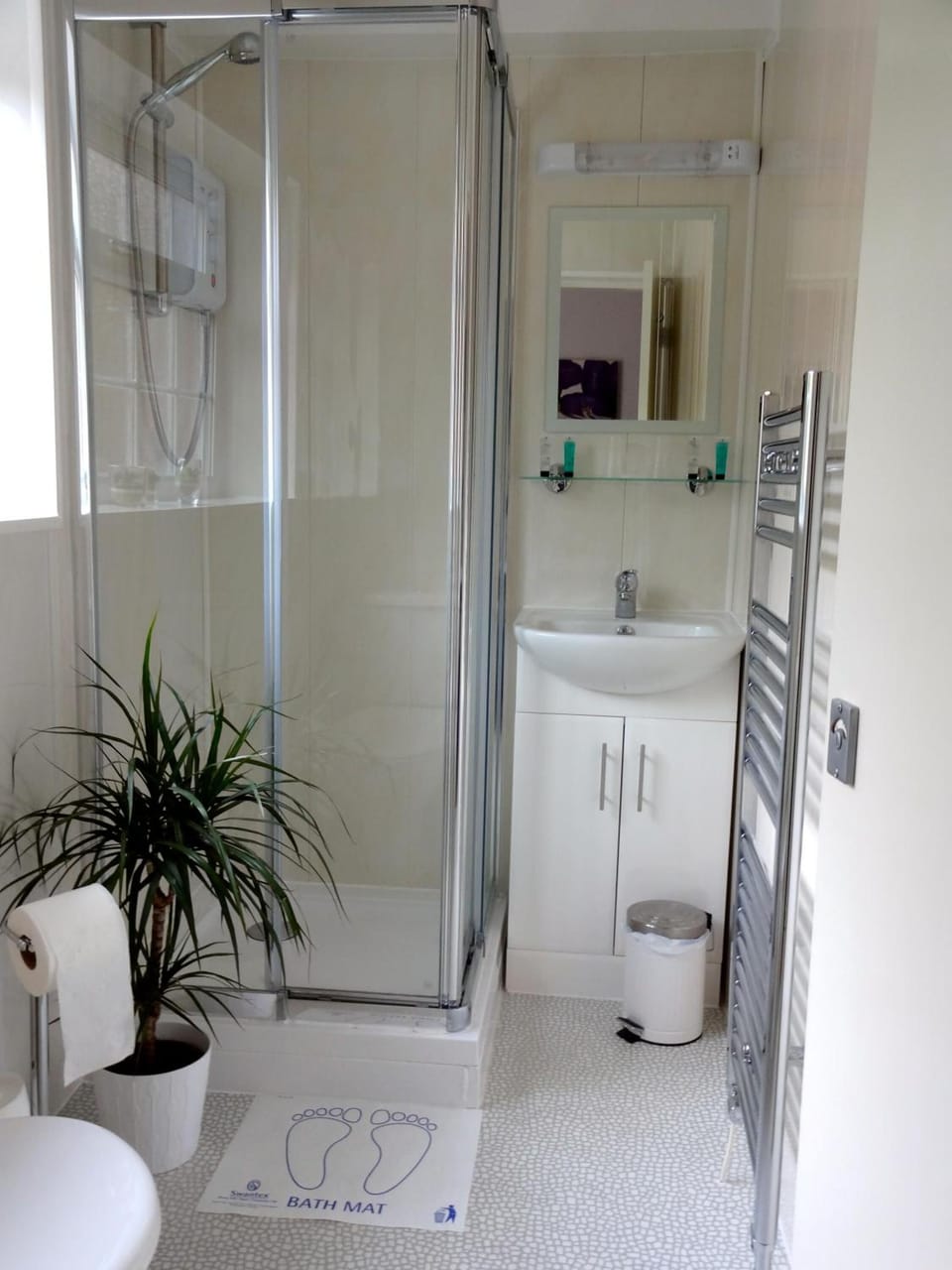 Shower, free toiletries, hair dryer, towels