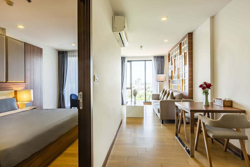 Suite, 1 Bedroom, City View, Garden Area | 1 bedroom, desk, blackout drapes, free WiFi