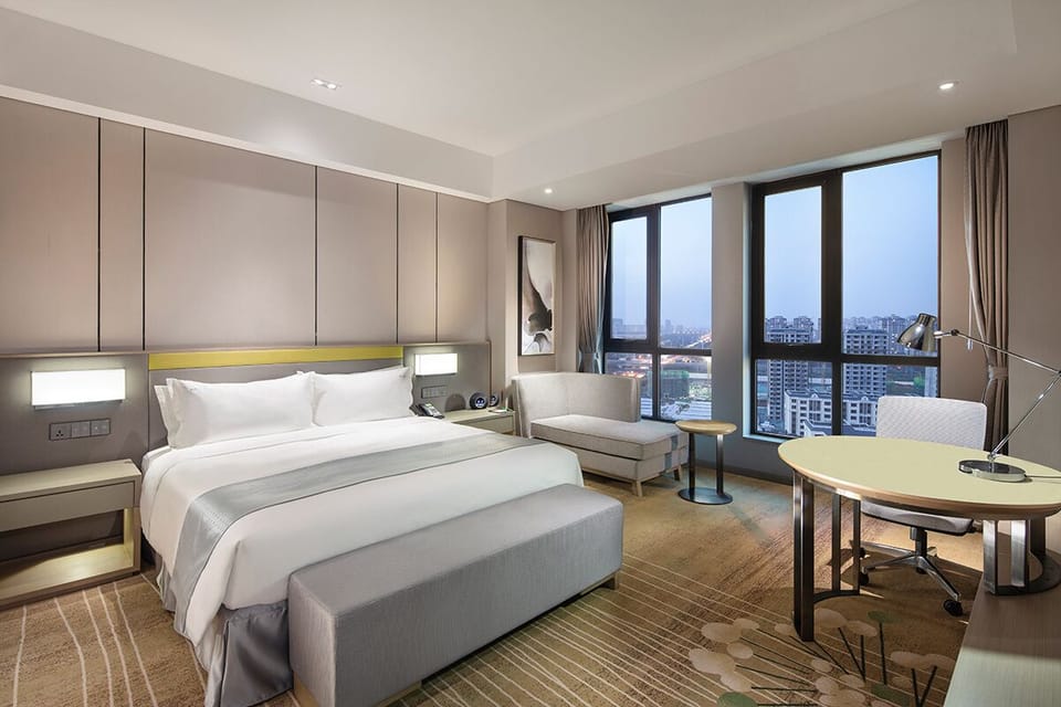 Suite, 1 Bedroom (Dining Area) | Minibar, in-room safe, soundproofing, iron/ironing board