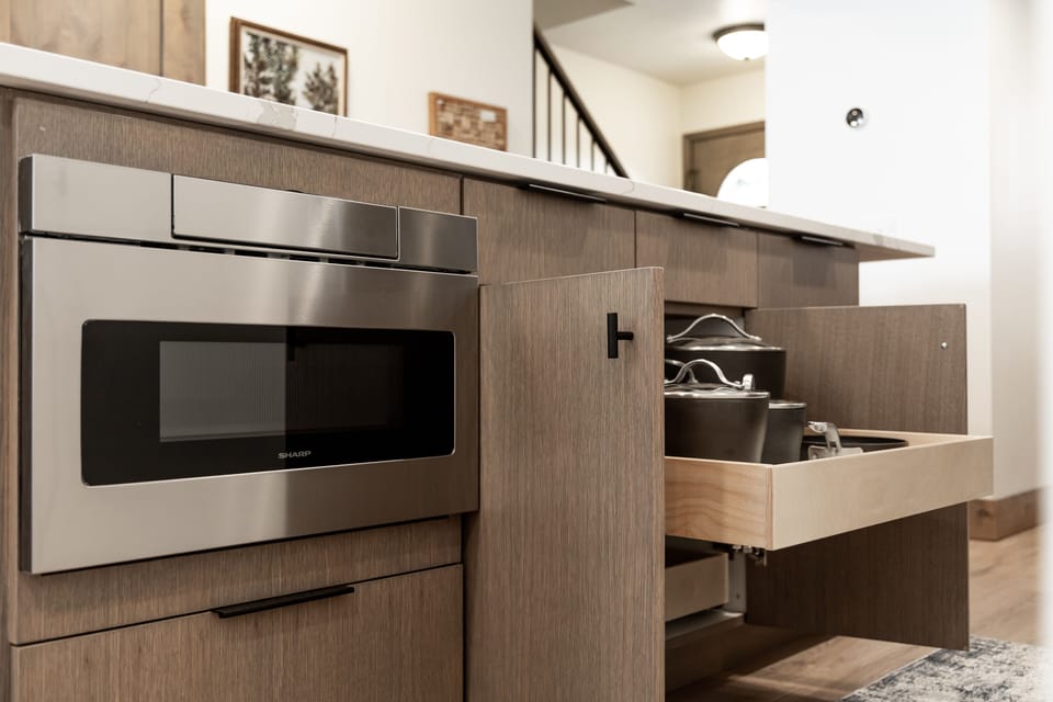 Drawer microwave. Lots of pots and pans to cook with.