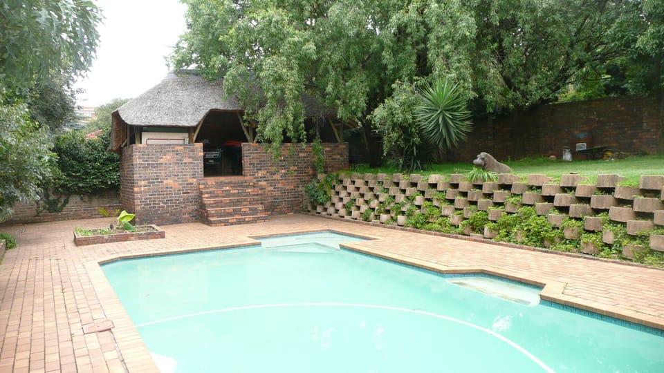 Pool with thatched lapa