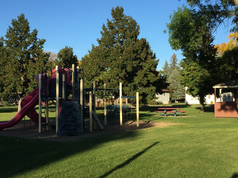 Park across the street with playground.
