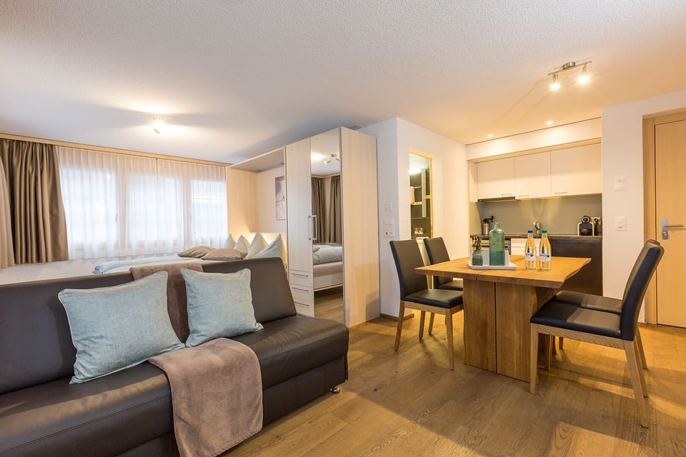 Studio, 1 Bedroom | Living area | 40-cm flat-screen TV with cable channels, TV