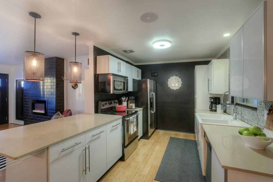Stainless appliances & Quartz counter-tops. Farm sink. Fully equipped kitchen.