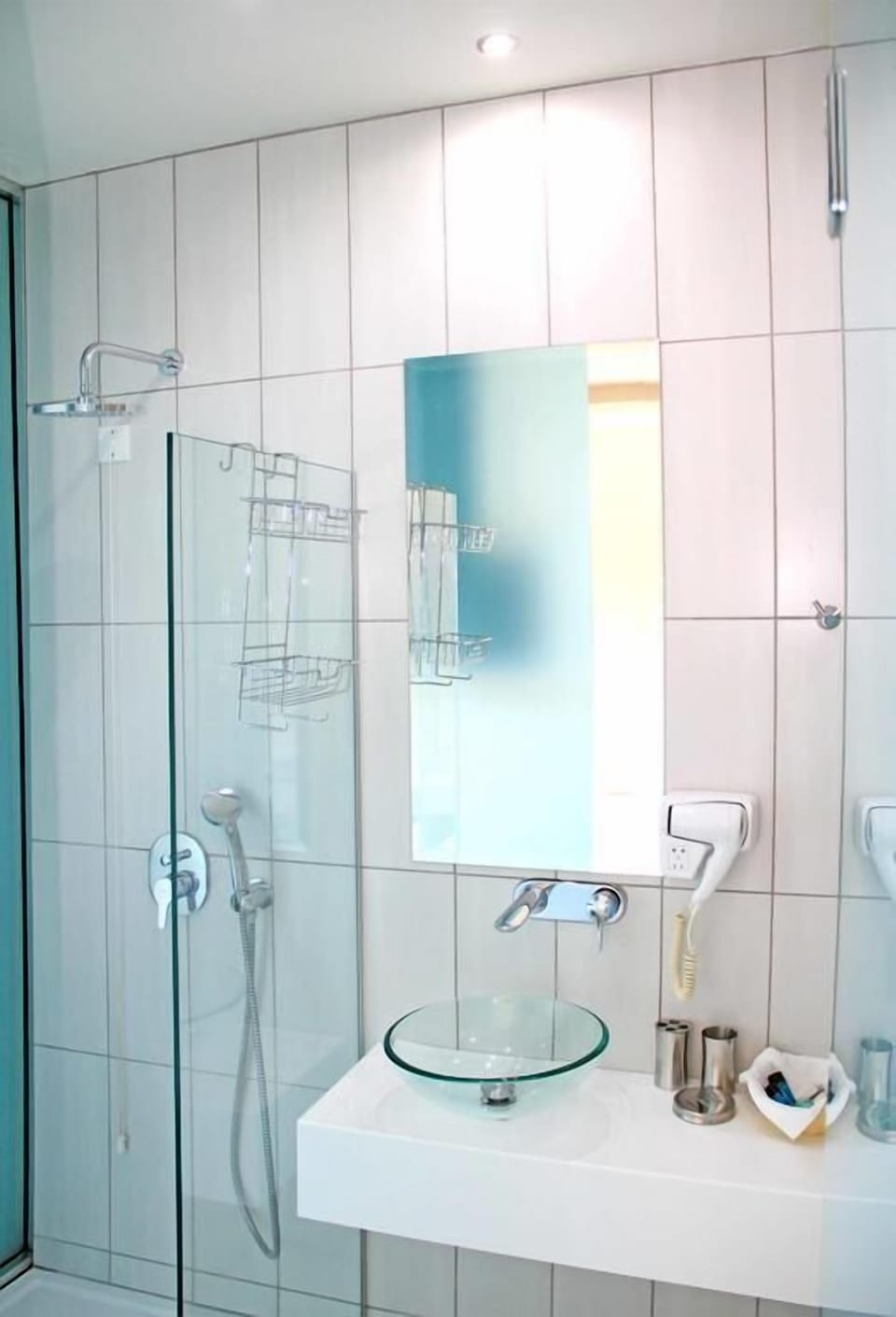 Shower, free toiletries, hair dryer, slippers